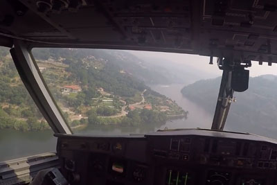 This Is How Canadair's Pilot Sees The Moment Of Picking Up Water From A Lake This Is How Canadair's Pilot Sees The Moment Of Picking Up Water From A Lake