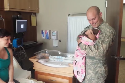 Emotional Moment When Soldier Returns Home To Meet His Baby For The First Time Emotional Moment When Soldier Returns Home To Meet His Baby For The First Time