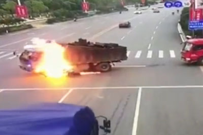 Motorcyclist From China Crashed Into Truck, Causing Both Vehicles To Explode Motorcyclist From China Crashed Into Truck, Causing Both Vehicles To Explode
