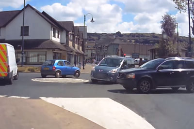 Dashcam Footage Shows An Unusual Crash At Roundabout Dashcam Footage Shows An Unusual Crash At Roundabout