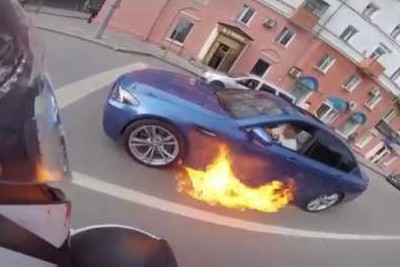 BMW Catches On Fire, Then Driver Tries To Drive Fast To Put The Fire Out BMW Catches On Fire, Then Driver Tries To Drive Fast To Put The Fire Out