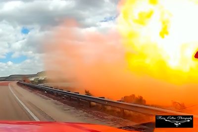 VIDEO: Voznik na kamero posnel grozljivo eksplozijo po tem, ko je iztiril vlak