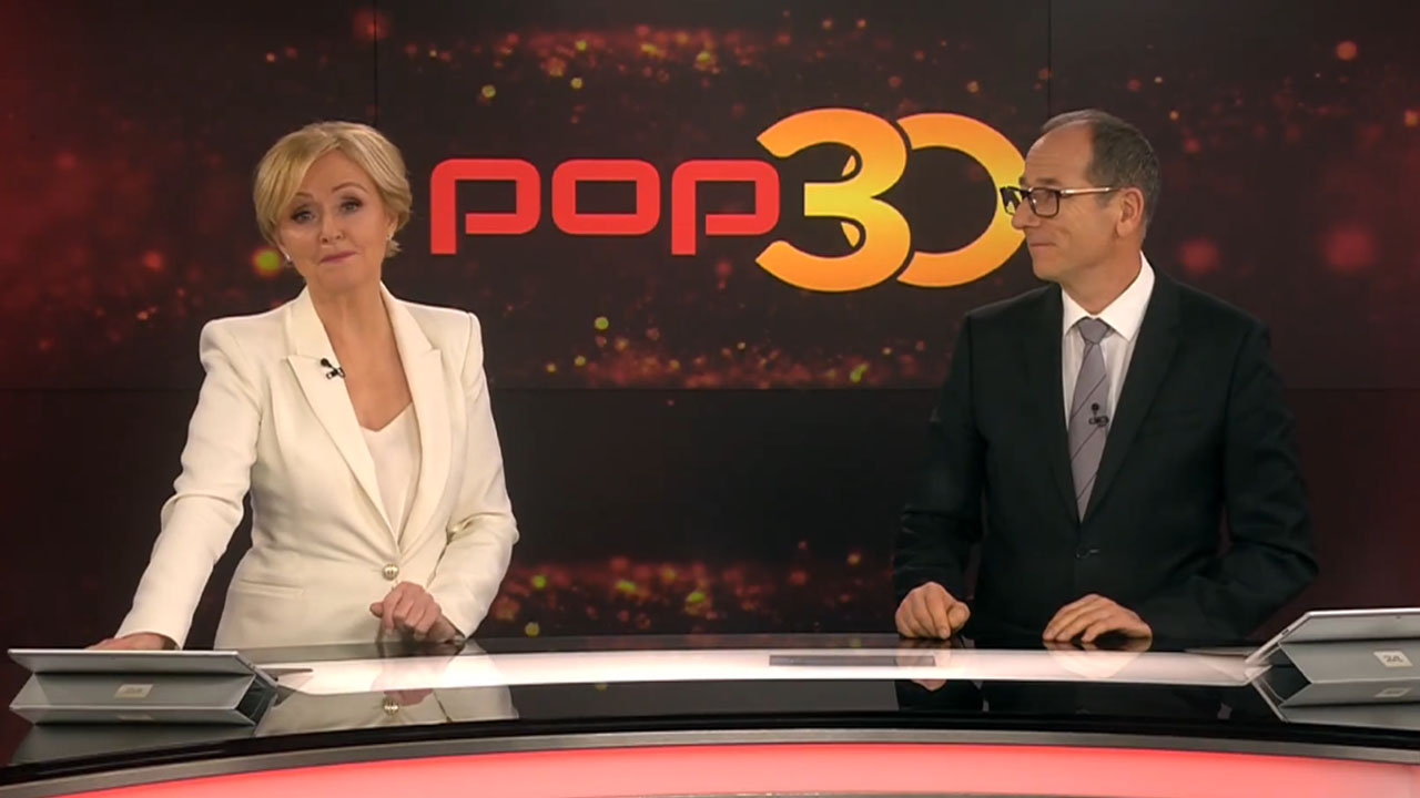 Darja Zgonc in Edi Pucer med vodenjem informativne oddaje 24UR na POP TV